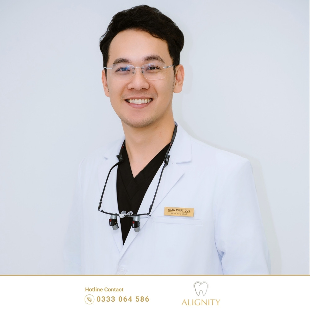 Trụ Implant Hiossen có tốt không? Ưu điểm & bảng giá 2026 4 Bác sĩ CKI Trần Phúc Duy - Giám đốc chuyên môn tại nha khoa ALIGNITY với hơn 10 năm kinh nghiệm - hoàn thành >1200 ca chỉnh nha thành công và thành viên Liên đoàn chỉnh nha thế giới WFO từ 2023 – nay